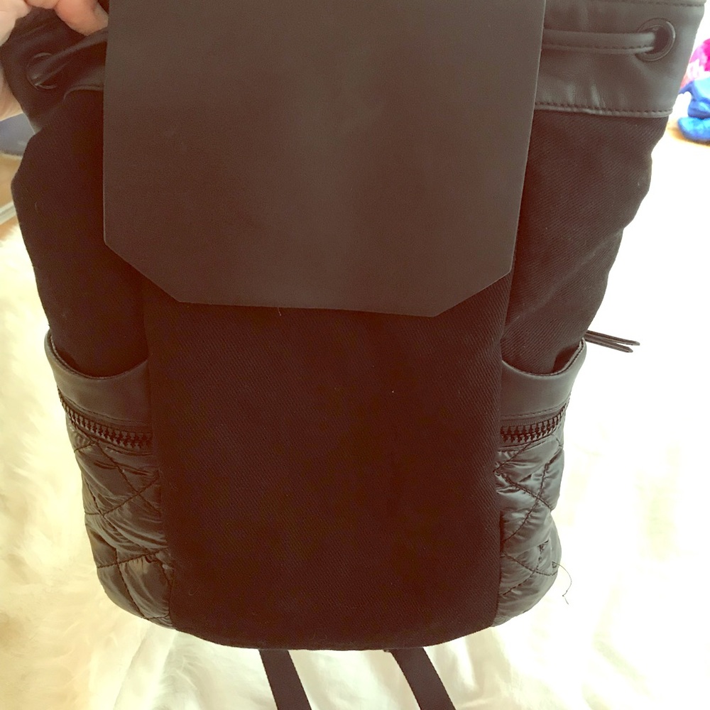 Designer faux black leather backpack purse